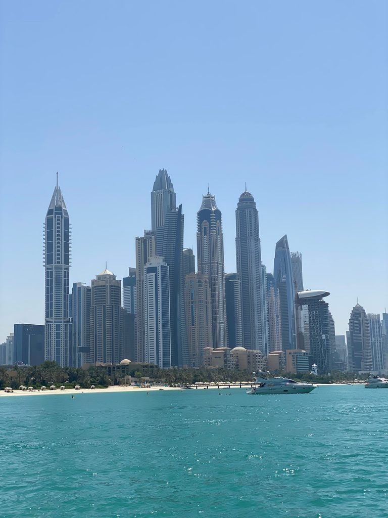 Dubai on a budget - city skyline at sunset.