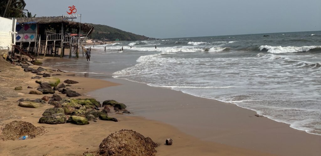 Things to do in Goa - beach with waves and a beach shack