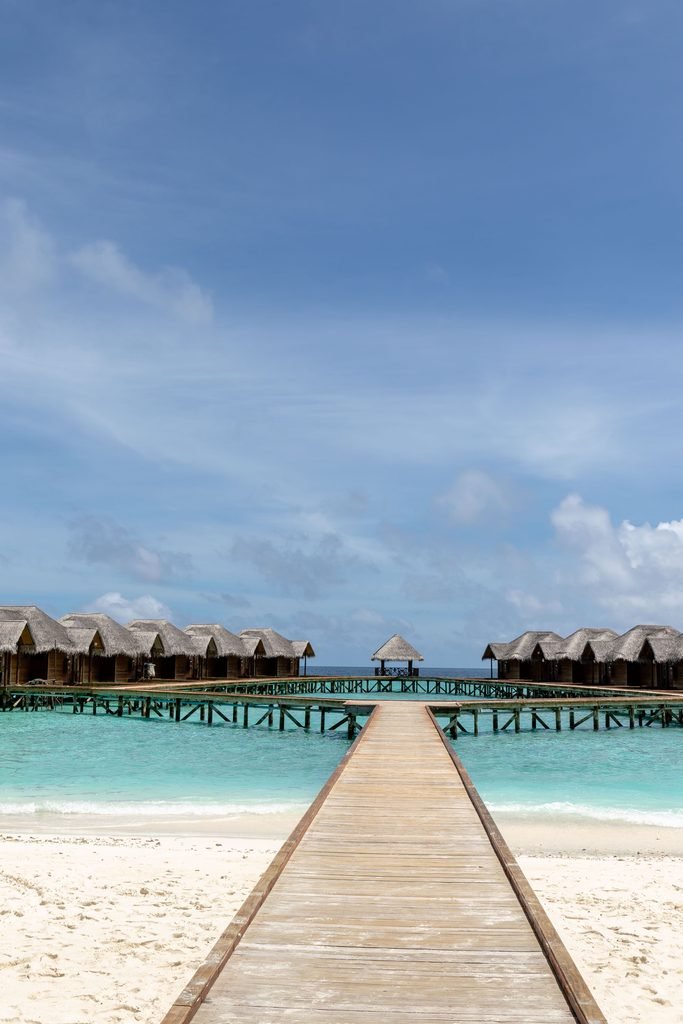 Best time to visit Maldives - clear blue lagoon and beach villas